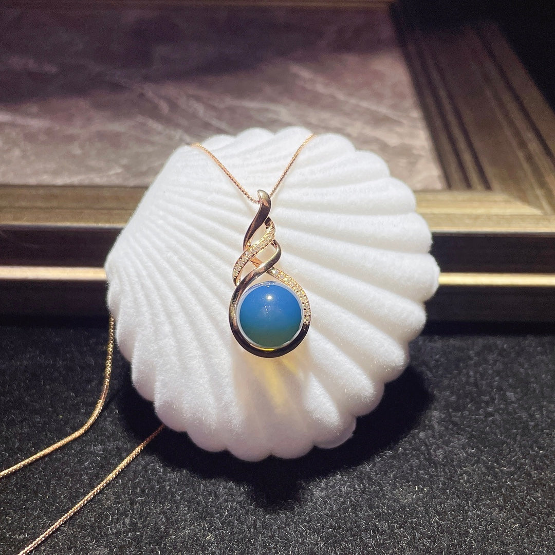 Pendentif en ambre bleu dominicain intégré en or 18 carats - Bijoux exquis