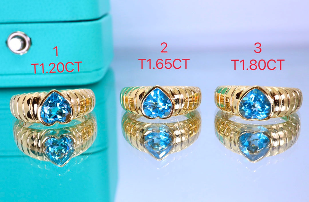 Squisito anello con topazio azzurro svizzero a forma di cuore: un gioiello imperdibile
