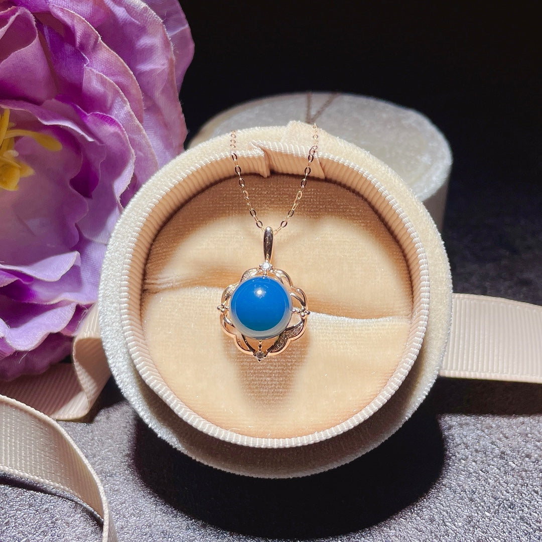 Exquis pendentif en ambre bleu dominicain incrusté d'or 18 carats - Bijoux pour l'élégance