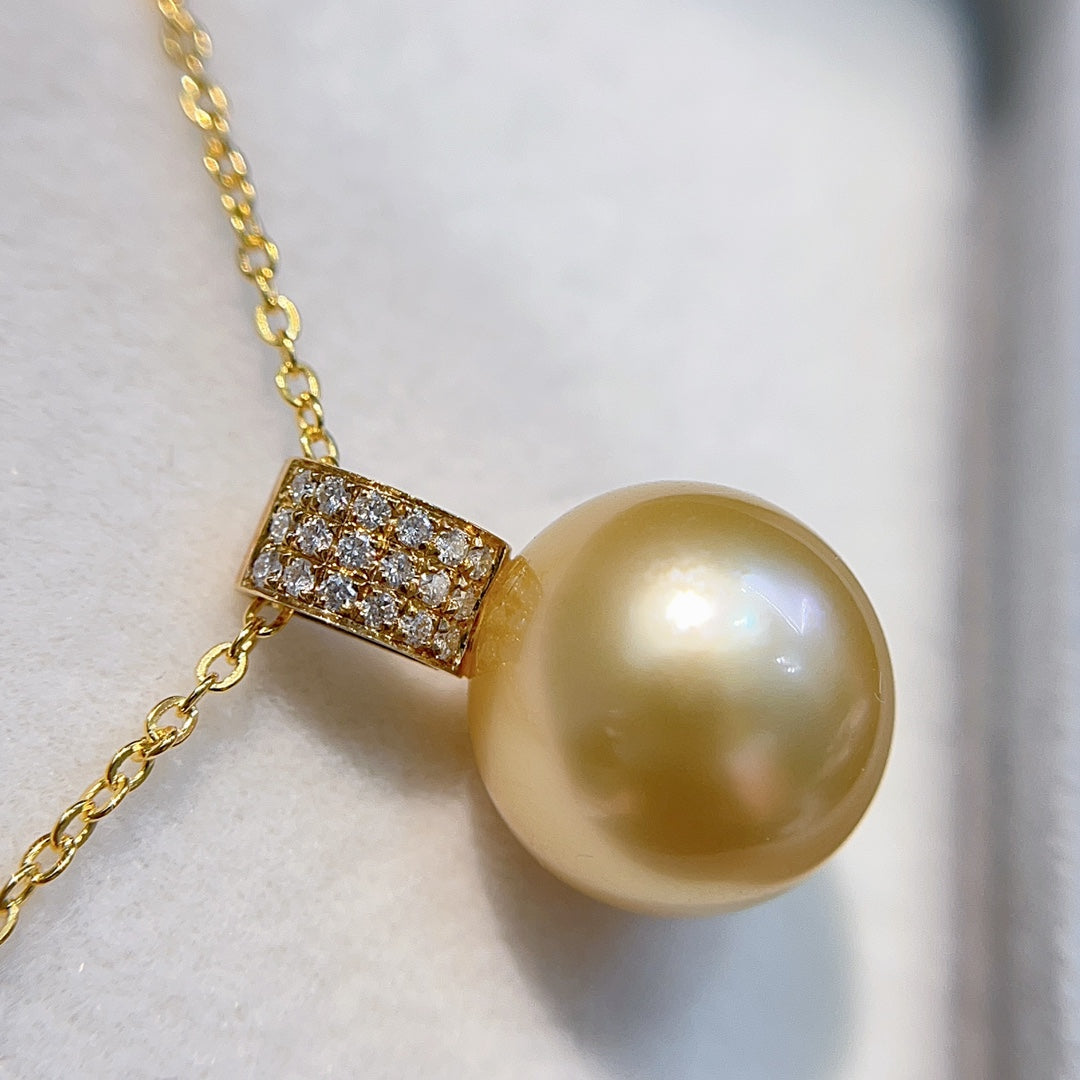 Luksusowa biżuteria z 18-karatowego złota 伴 Diament 12,1 mm Naturalna złota perła z Morza Południowego