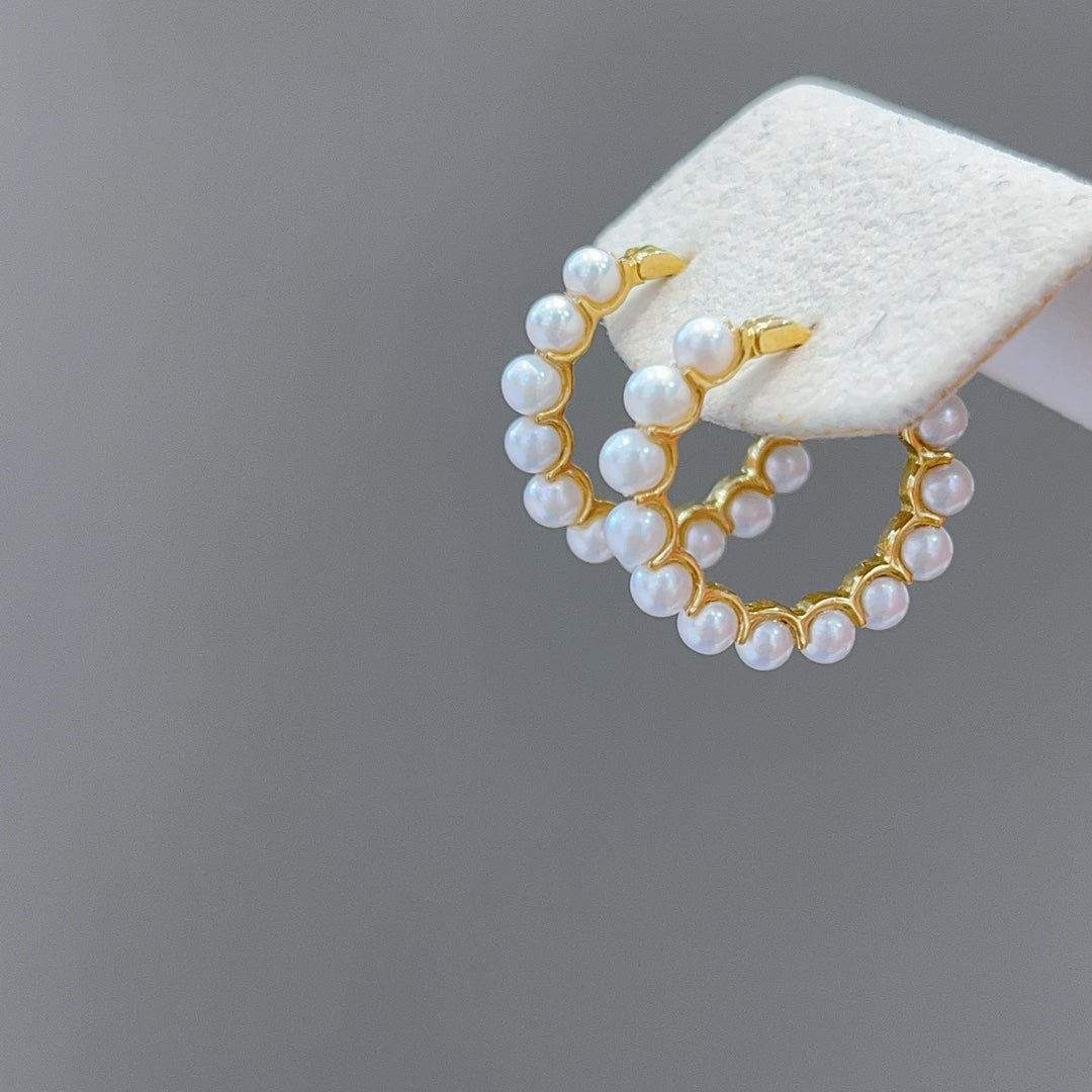 Elegante joyería de oro de 18k y perlas naturales de agua dulce