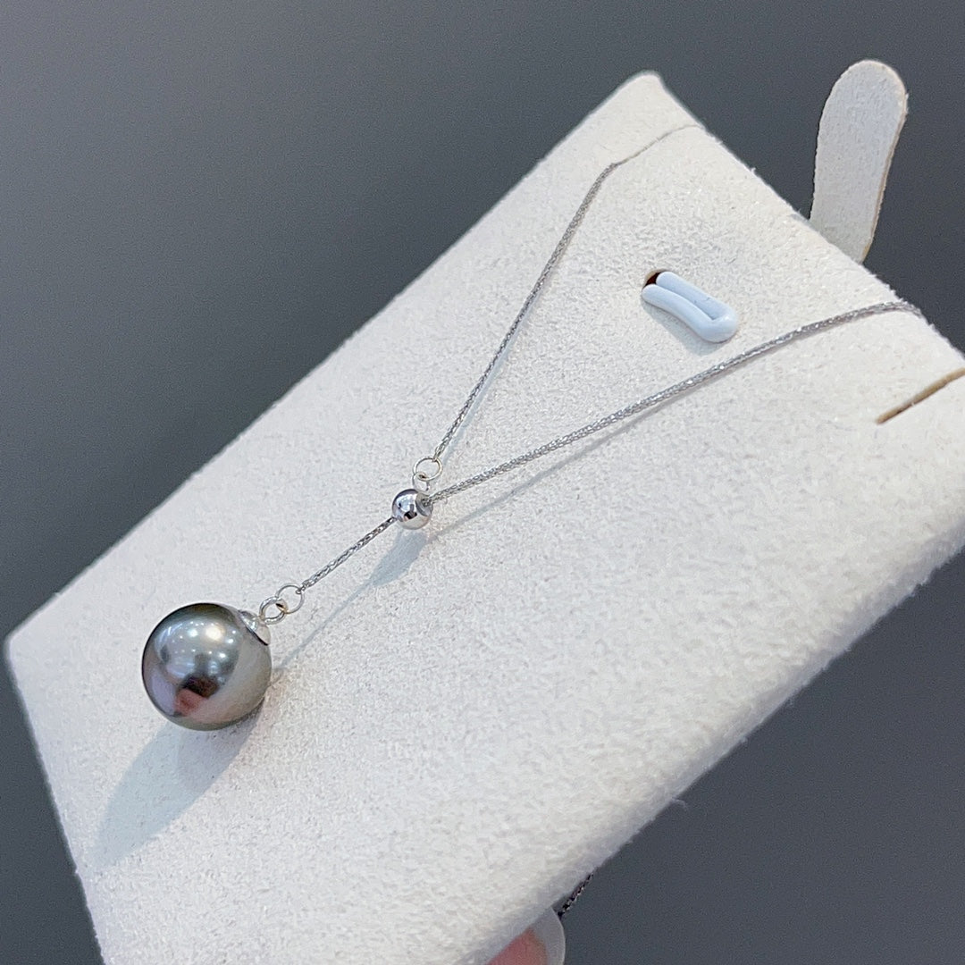 Bijoux de luxe en or 18 carats et perles noires de Tahiti de 8 à 9 mm