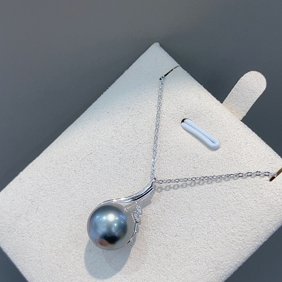 Exquisite 18K Diamond & Tahitian Black Pearl Jewelry