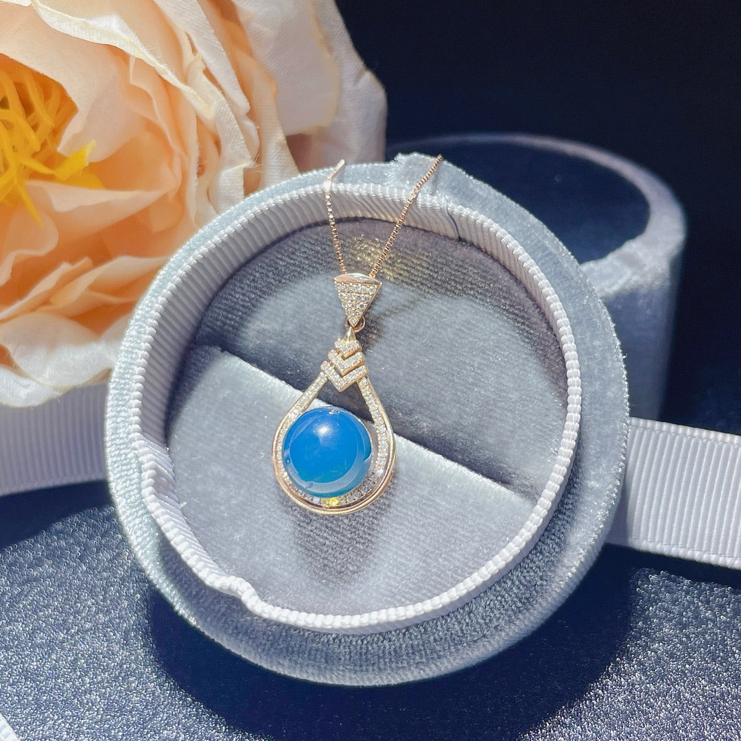 Nouveauté exclusive : bijoux pendentif en ambre bleu dominicain incrustés d'or 18 carats