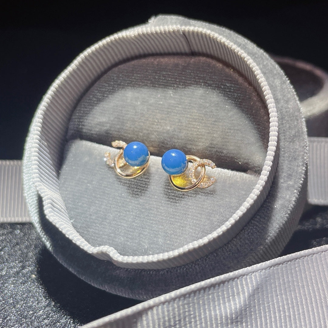 Exquisite 18K Gold Embedded Dominican Blue Amber Earrings - Unique Jewelry