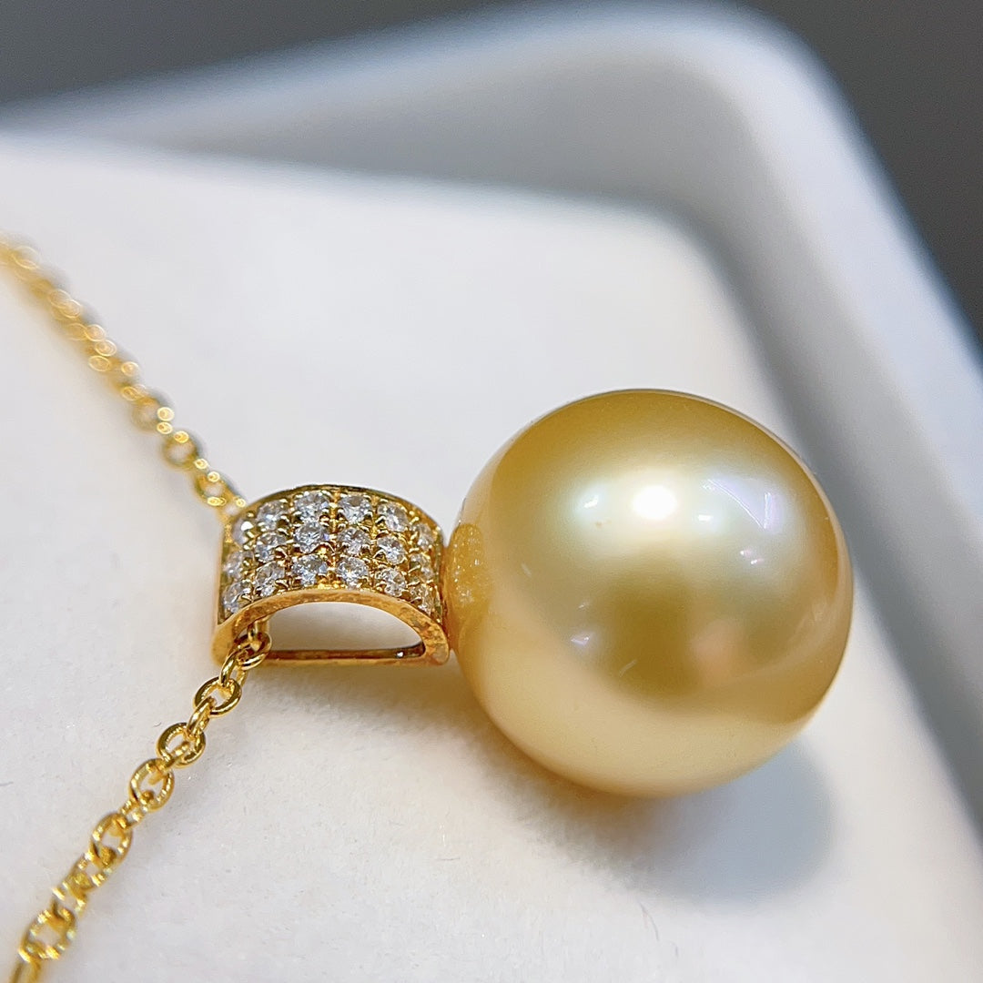 Luksusowa biżuteria z 18-karatowego złota 伴 Diament 12,1 mm Naturalna złota perła z Morza Południowego