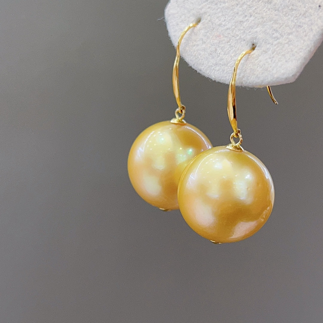 Luxe 15,6 mm Zuidzee gouden pareloorbellen in 18K goud - een must-have voor sieraden