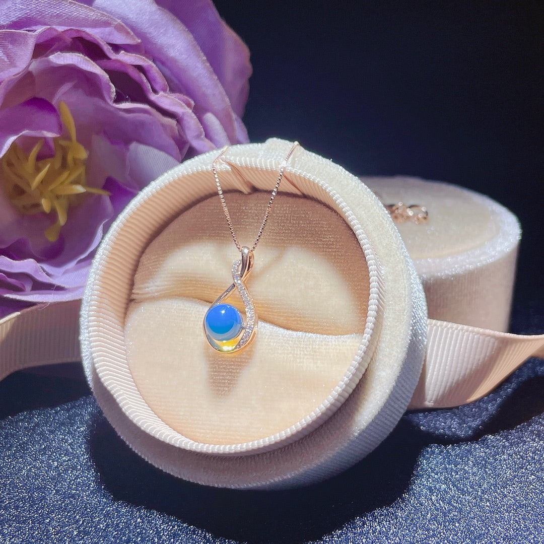 Pendentif en ambre bleu dominicain intégré en or 18 carats - Bijoux exquis