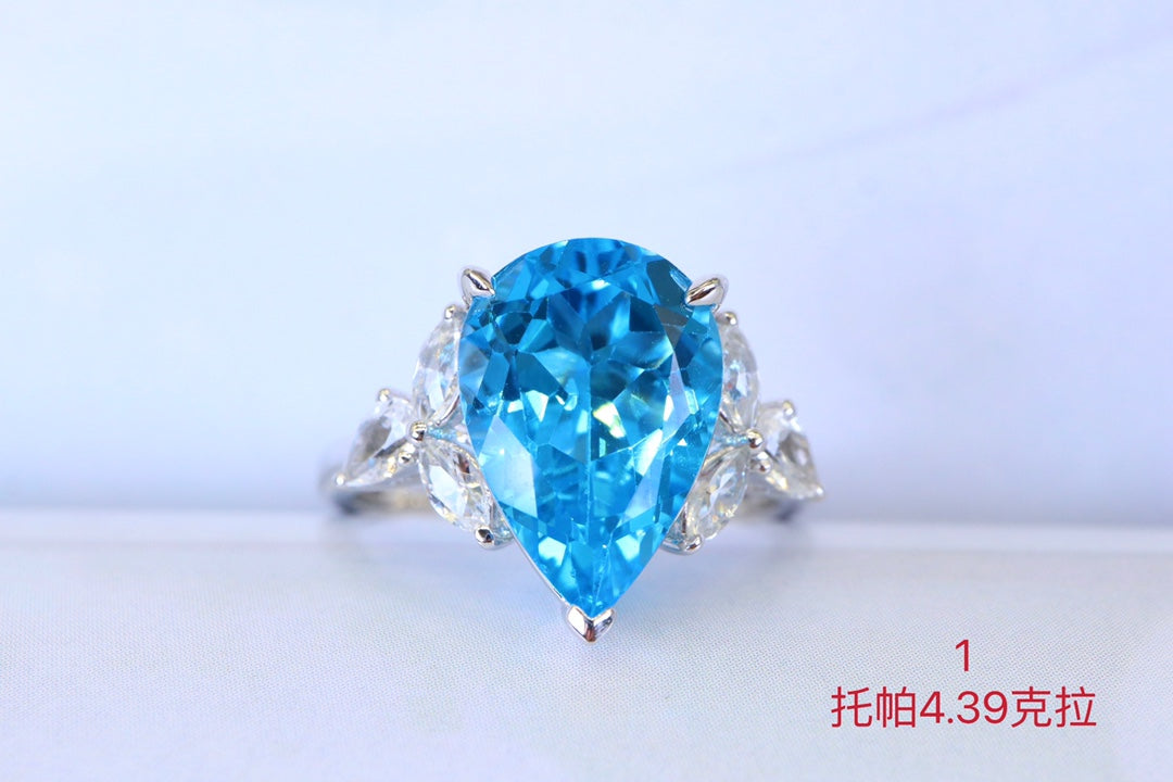 Swiss Blue Topaz Ring with 18K Gold and Diamonds - Elegant Jewelry