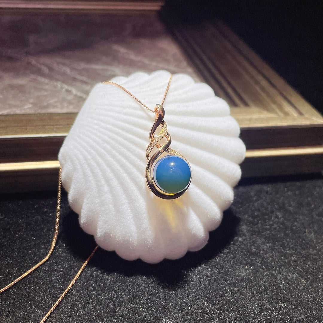 Pendentif en ambre bleu dominicain intégré en or 18 carats - Bijoux exquis