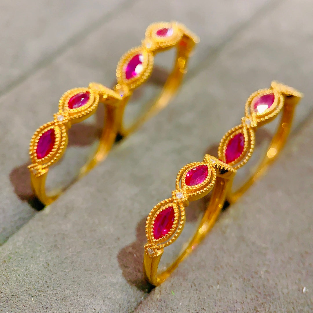 Mesmerizing Ruby Marquise Ring - Elegant 18k Gold Embedded Jewelry