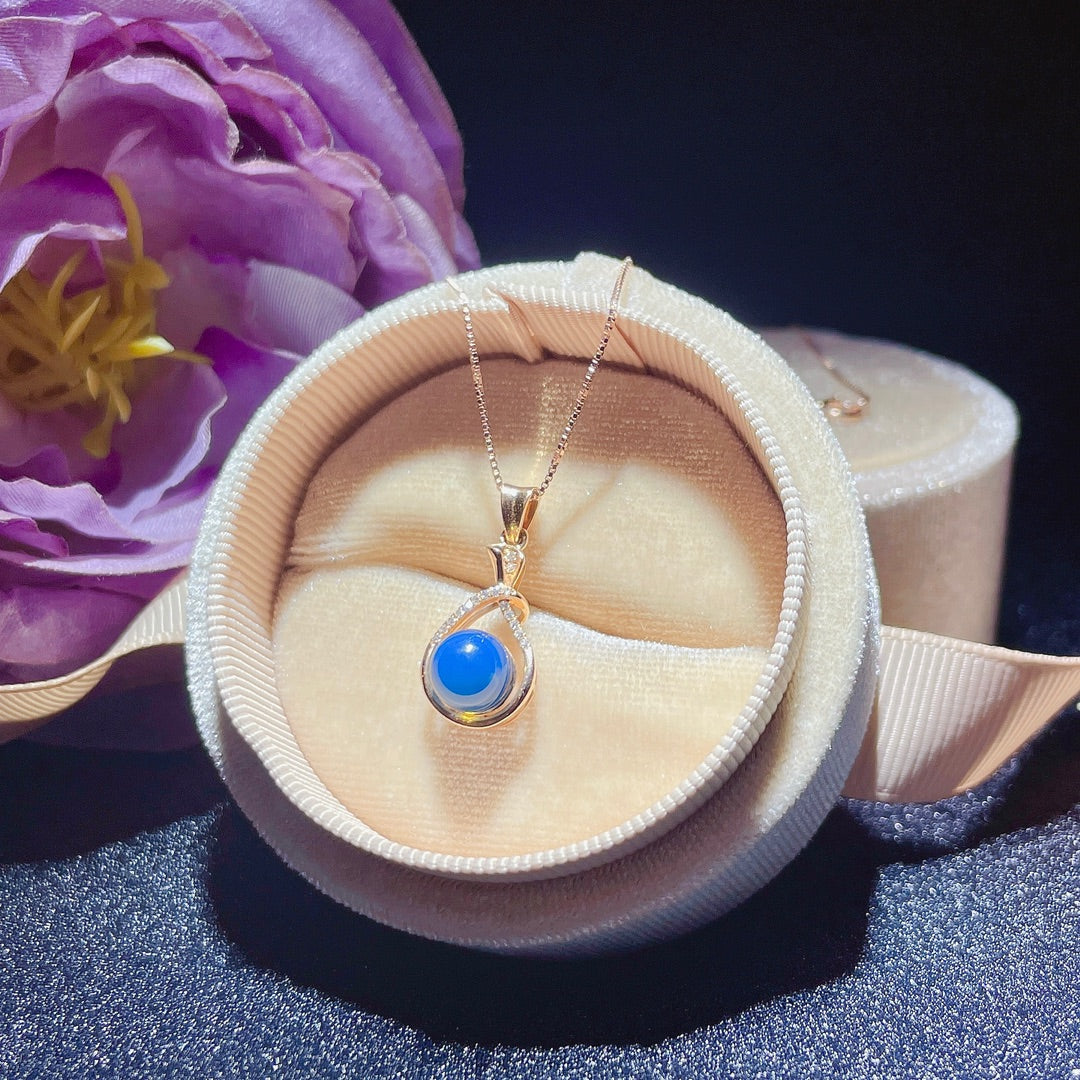 Exquis pendentif en ambre bleu dominicain incrusté d'or 18 carats - Bijoux