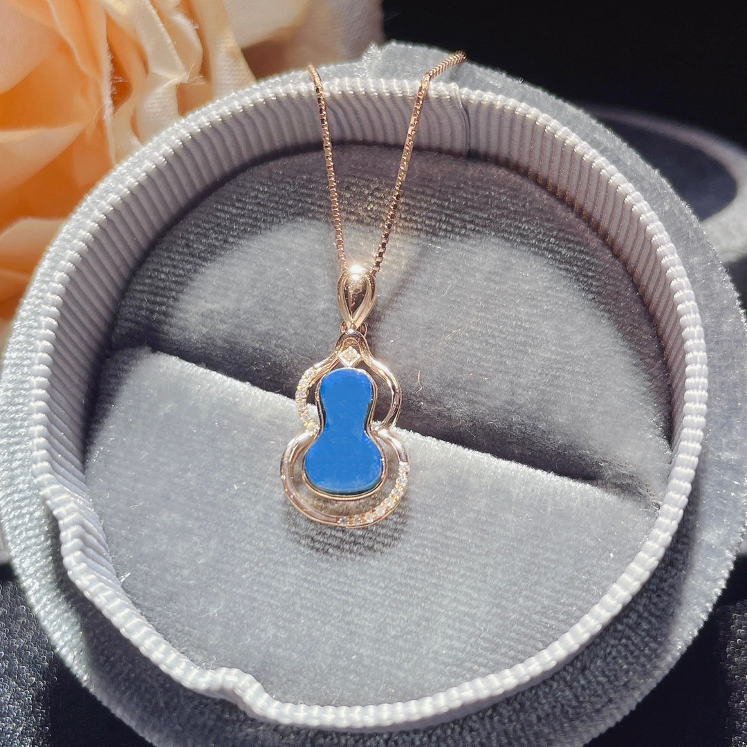 Exquis pendentif en ambre bleu dominicain incrusté d'or 18 carats - Bijoux