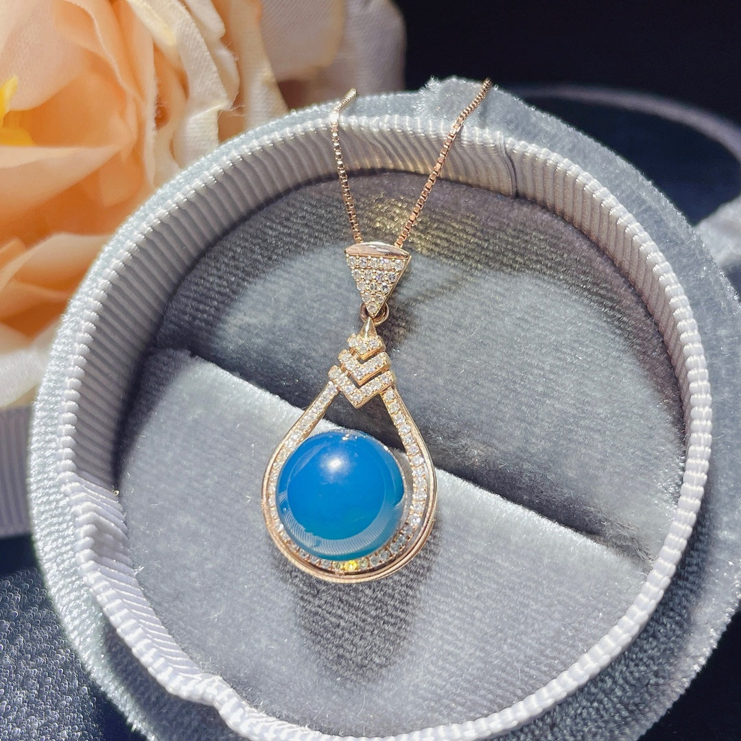 Nouveauté exclusive : bijoux pendentif en ambre bleu dominicain incrustés d'or 18 carats
