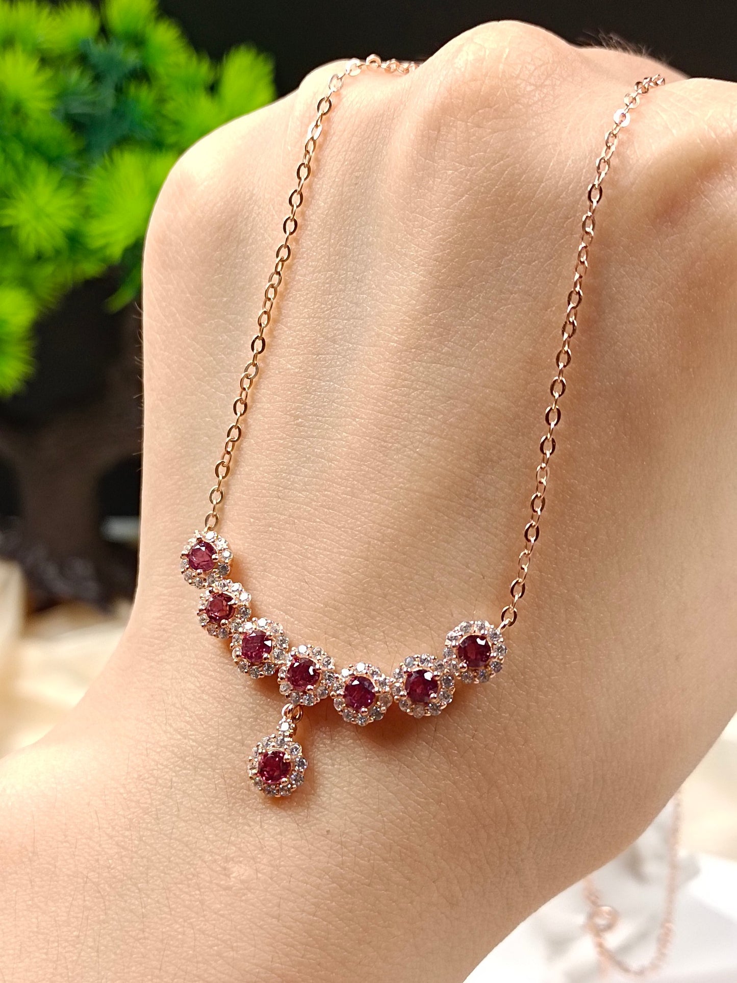 This S925 silver necklace features intricate craftsmanship, combining 925 sterling silver and purple garnet.