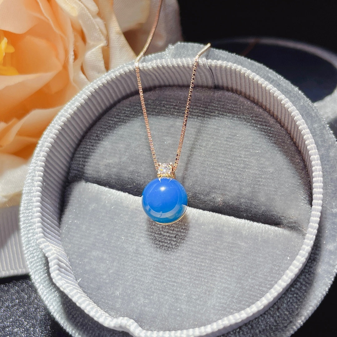 Nouveauté exclusive : Pendentif en ambre bleu dominicain incrusté d'or 18 carats - Bijoux de luxe