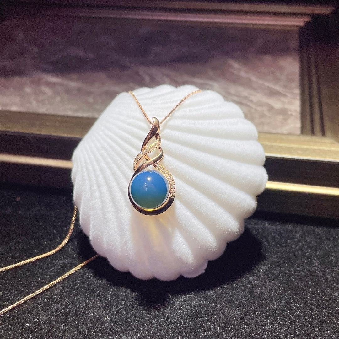 Pendentif en ambre bleu dominicain intégré en or 18 carats - Bijoux exquis
