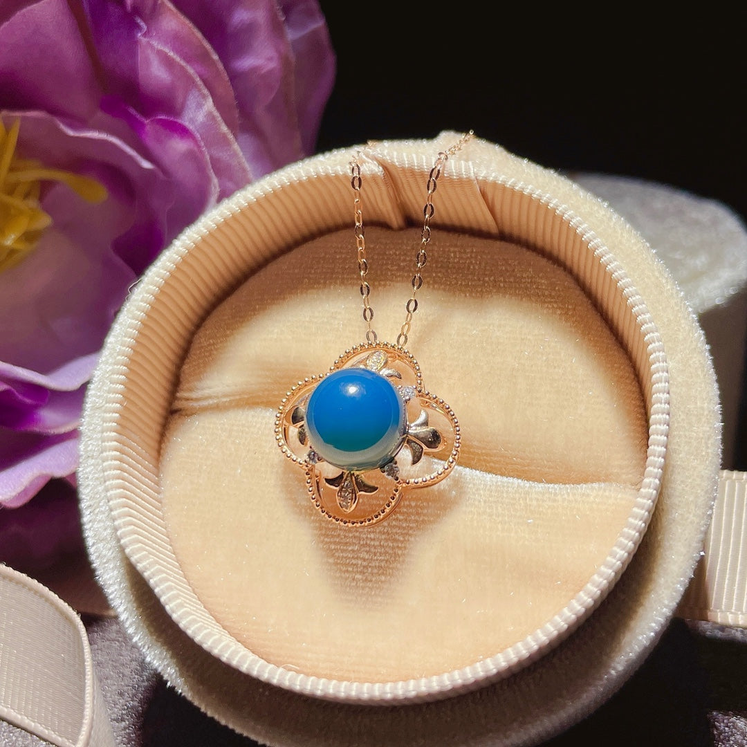 Exquis pendentif en ambre bleu dominicain incrusté d'or 18 carats - Bijoux pour l'élégance