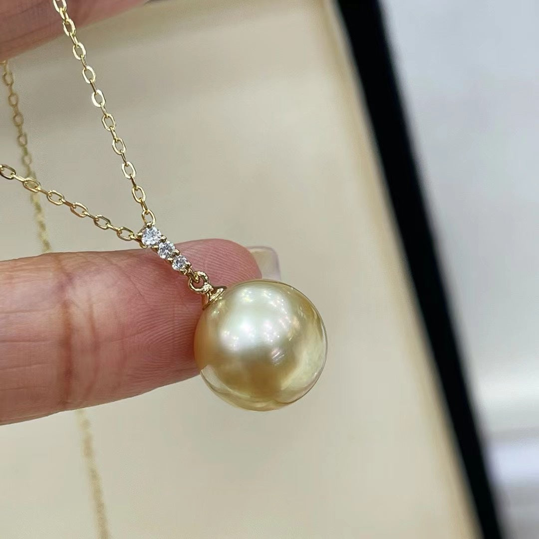 Exquisita joyería de perlas doradas naturales del Mar del Sur de 12-13 mm con detalles de diamantes de 18 quilates