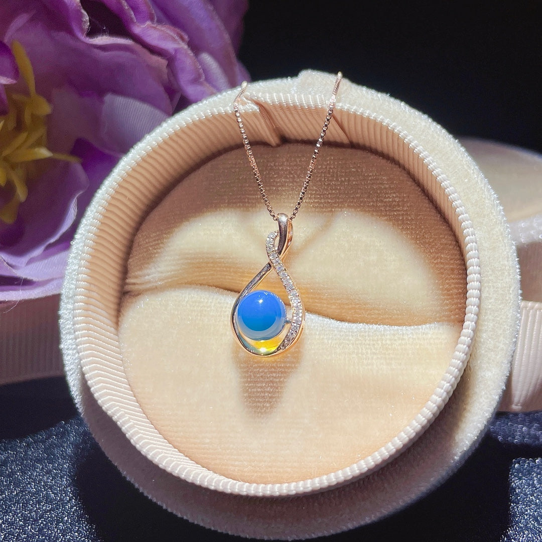 Pendentif en ambre bleu dominicain intégré en or 18 carats - Bijoux exquis
