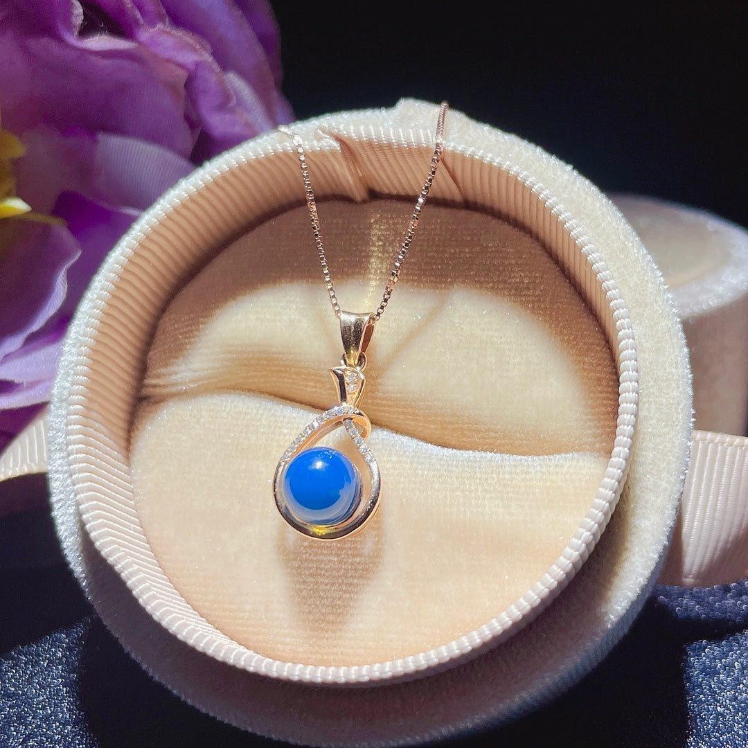 Exquis pendentif en ambre bleu dominicain incrusté d'or 18 carats - Bijoux