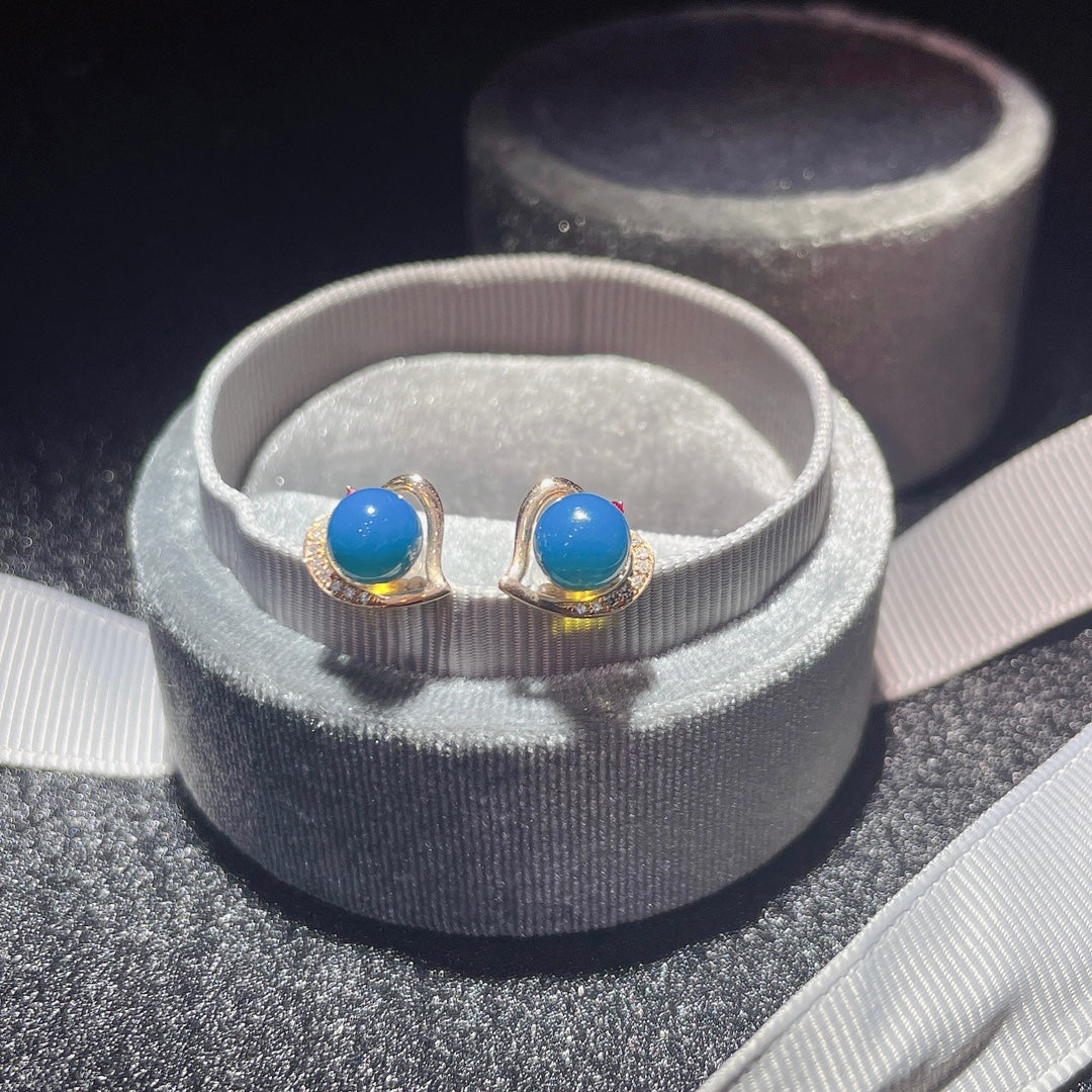 Unleash Your Aura with 18K Gold Embedded Dominican Blue Amber Earrings - Jewelry for the Unique You
