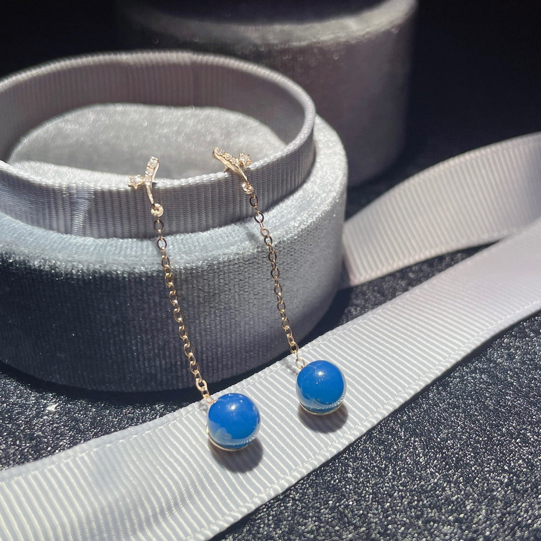 Exquisite 18k Gold Embedded Dominican Blue Amber Earrings - A Surprise of Serendipity