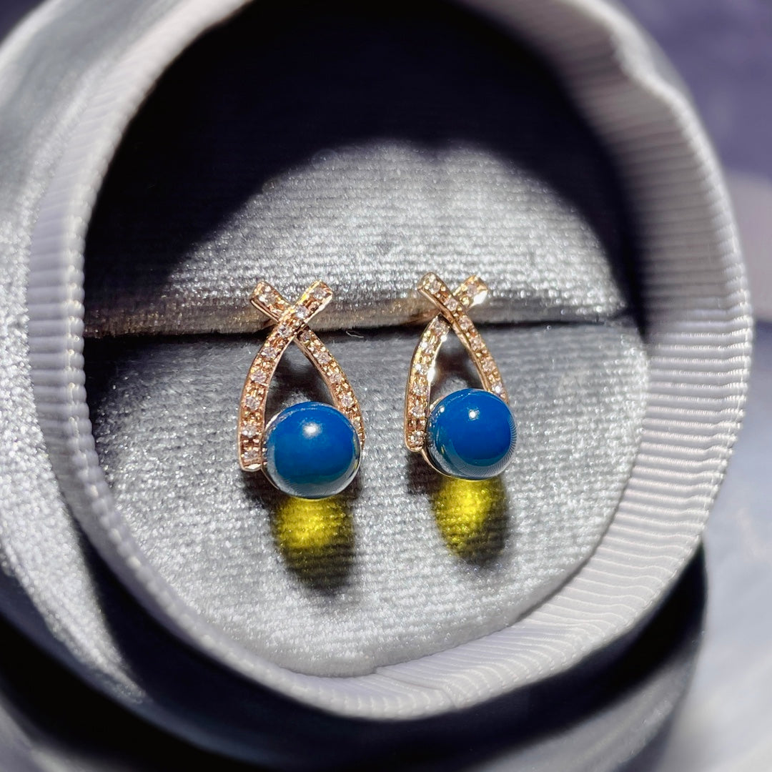 Elegant and Unforced Fashion: 18K Gold Embedded Dominican Blue Amber Earrings