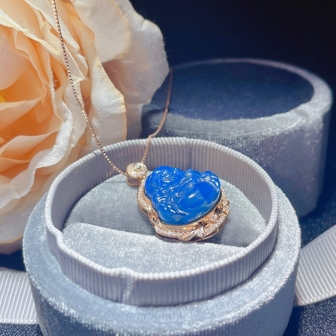 Nouveauté : Pendentif « Bouddha » en or 18 carats incrusté d'ambre bleu dominicain - Bijoux