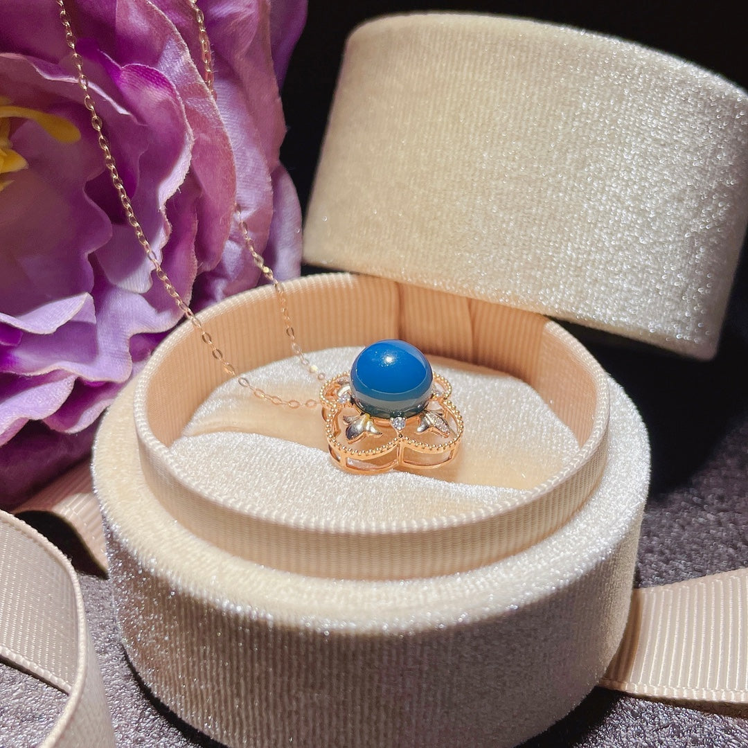 Exquis pendentif en ambre bleu dominicain incrusté d'or 18 carats - Bijoux pour l'élégance