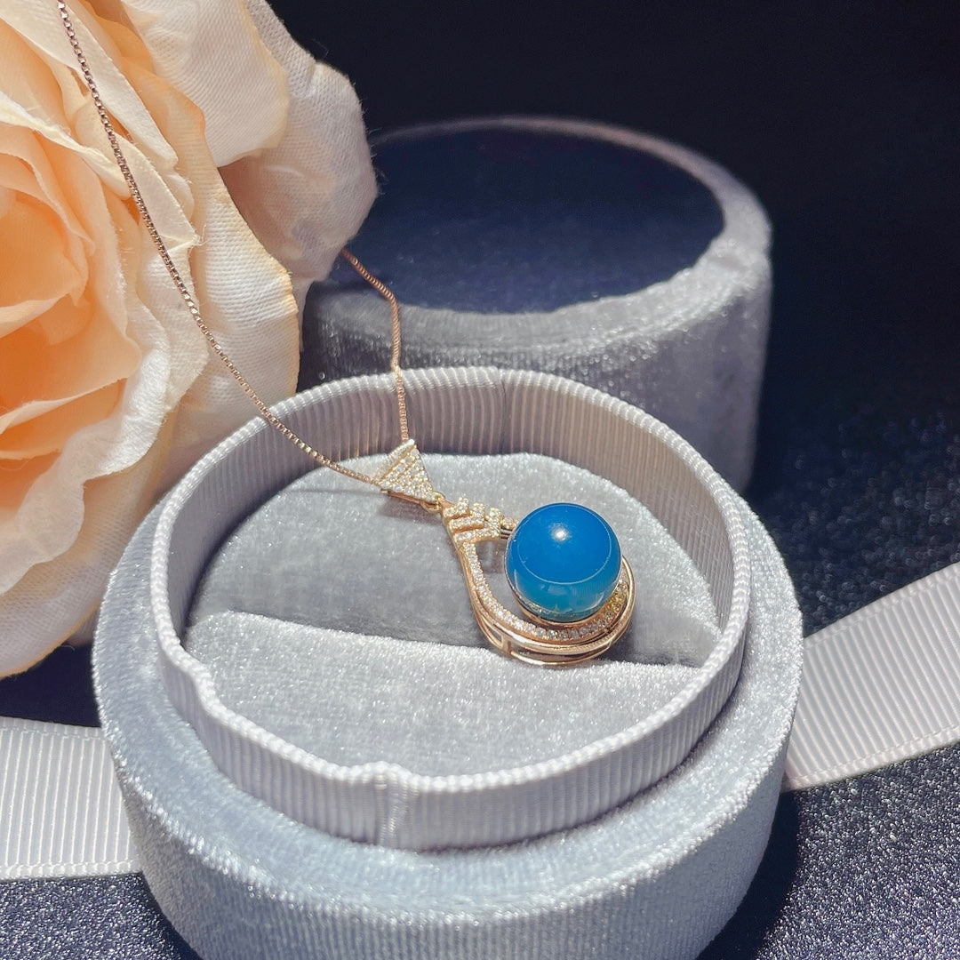 Nouveauté exclusive : bijoux pendentif en ambre bleu dominicain incrustés d'or 18 carats