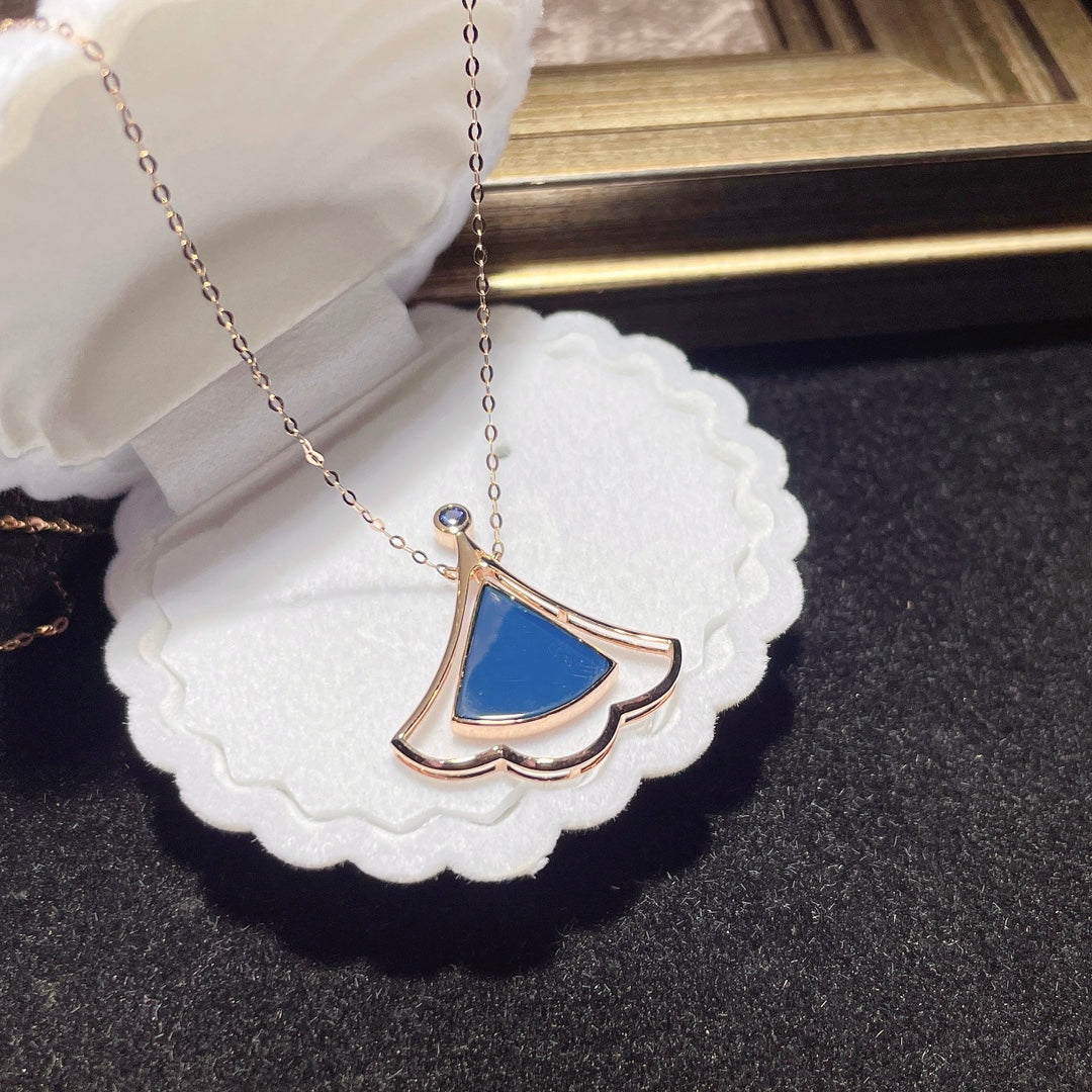 Jewelry Exclusive: 18K Gold Embedded Dominican Blue Amber Pendant