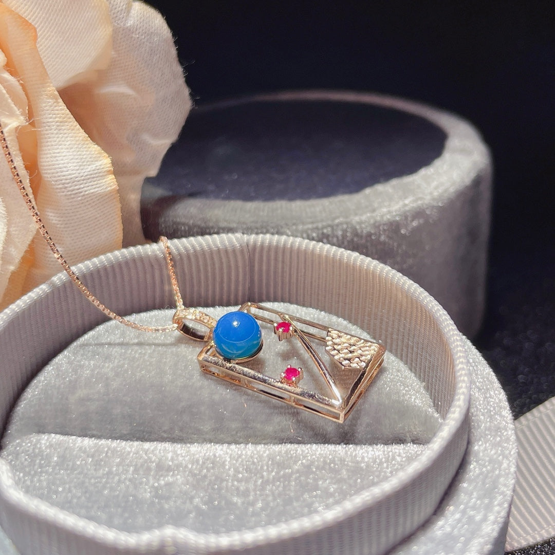 Exquis pendentif en ambre bleu dominicain incrusté d'or 18 carats - Bijoux pour rêves
