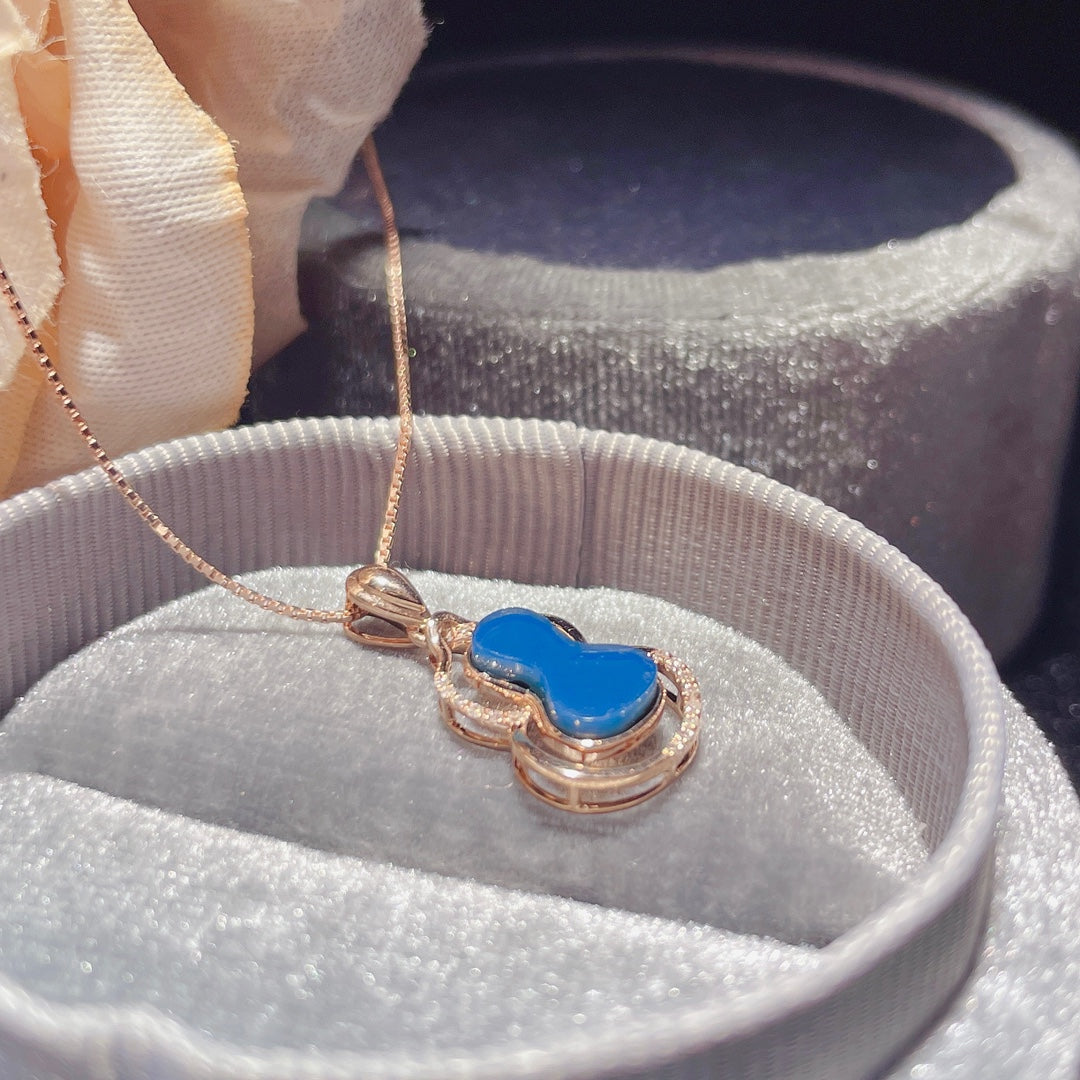 Exquis pendentif en ambre bleu dominicain incrusté d'or 18 carats - Bijoux