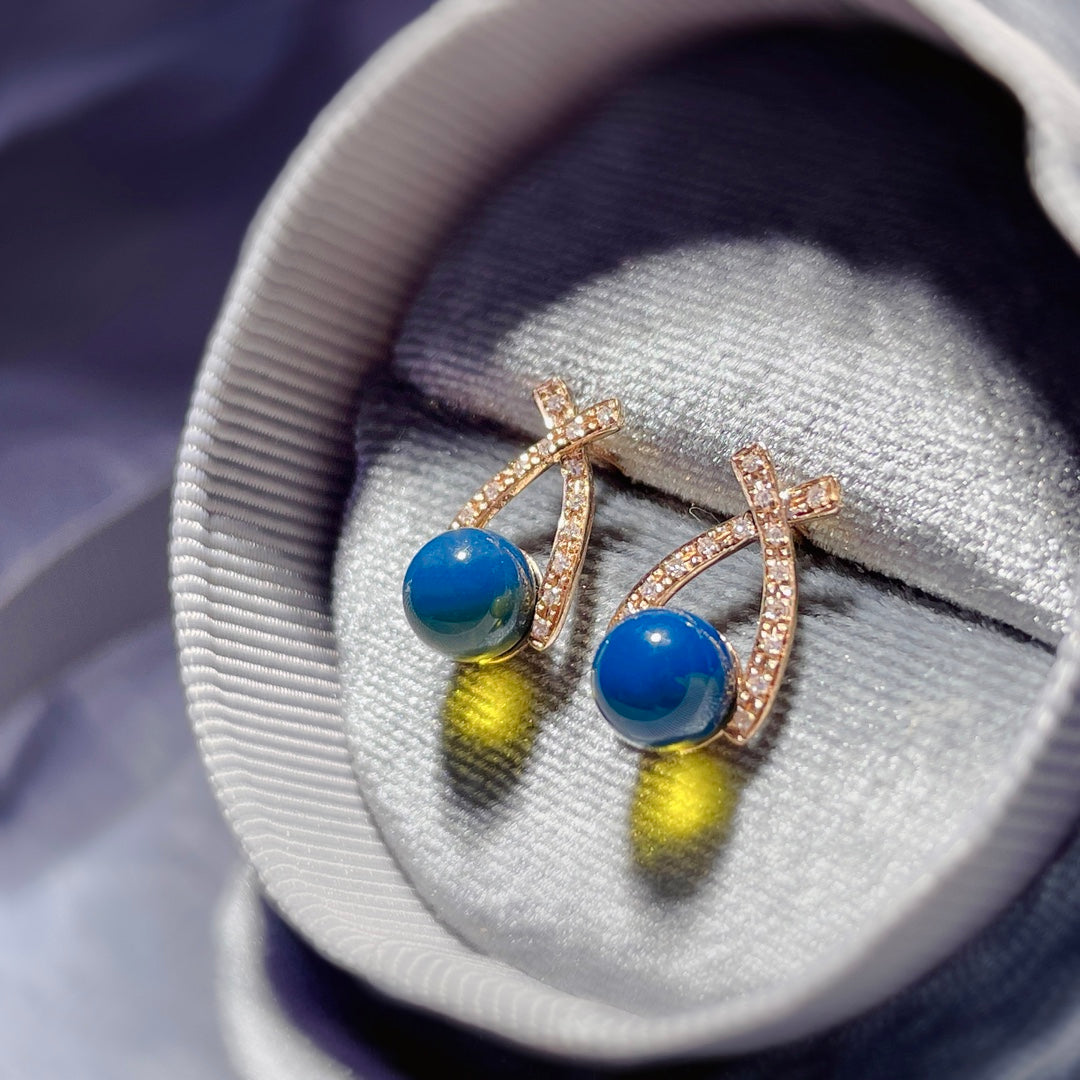 Elegant and Unforced Fashion: 18K Gold Embedded Dominican Blue Amber Earrings