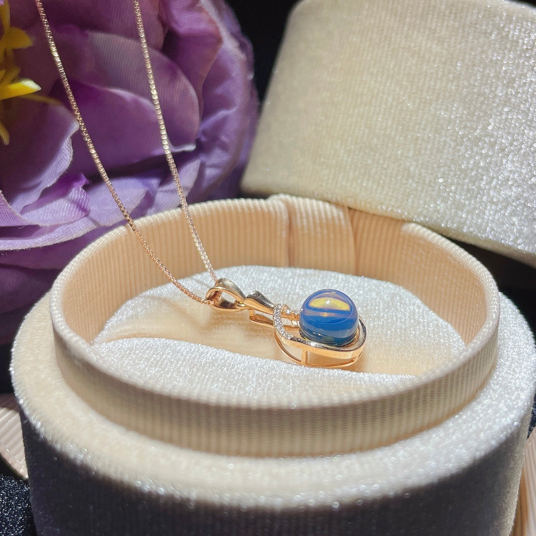 Exquis pendentif en ambre bleu dominicain incrusté d'or 18 carats - Bijoux
