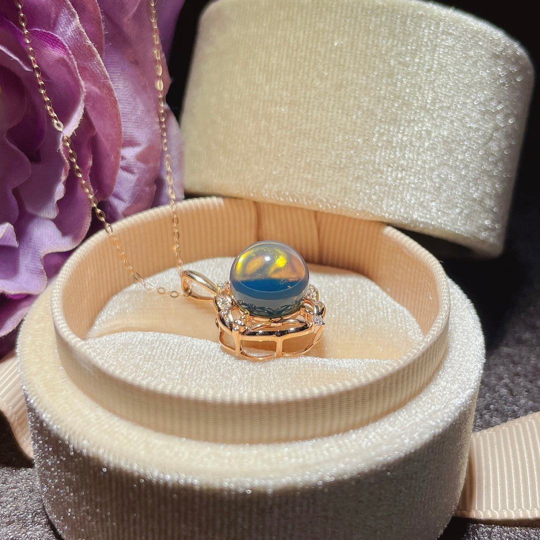 Exquis pendentif en ambre bleu dominicain incrusté d'or 18 carats - Bijoux pour l'élégance