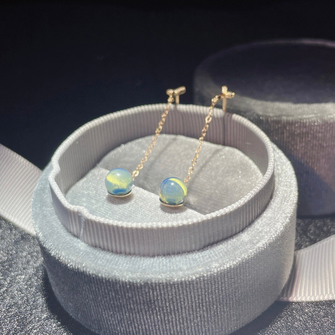 Exquisite 18k Gold Embedded Dominican Blue Amber Earrings - A Surprise of Serendipity