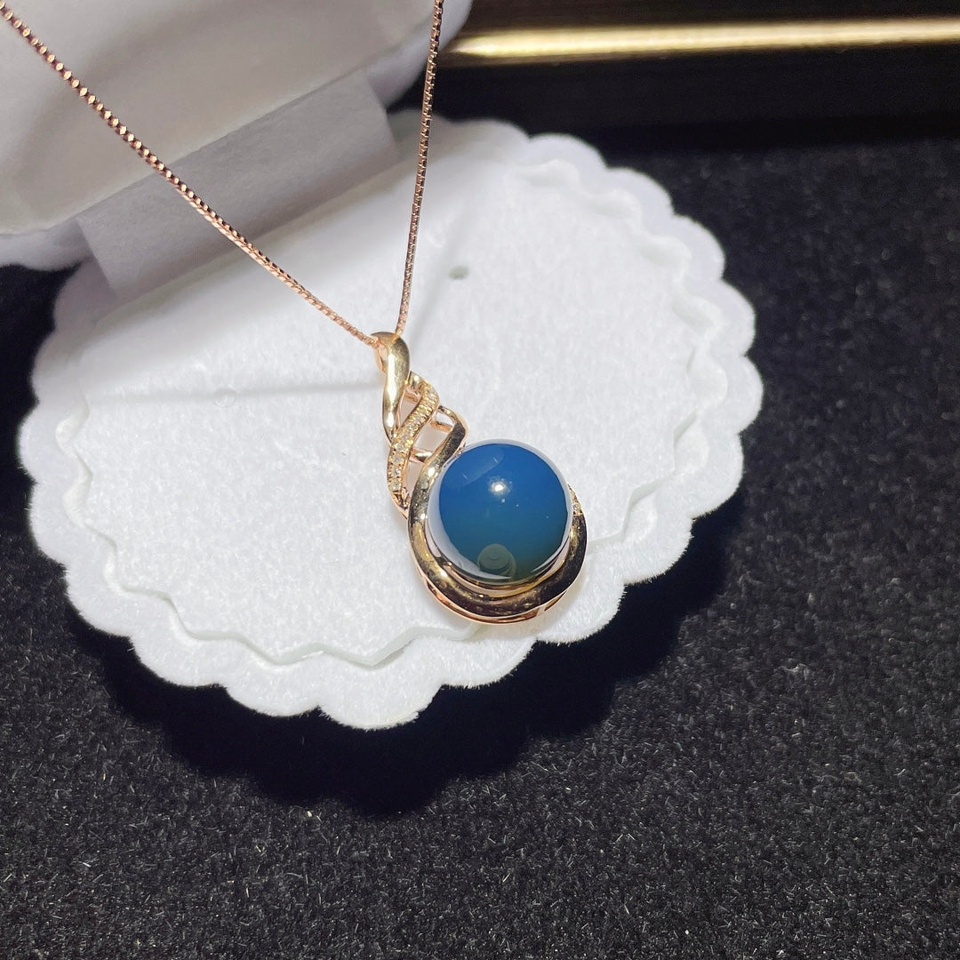 Pendentif en ambre bleu dominicain intégré en or 18 carats - Bijoux exquis
