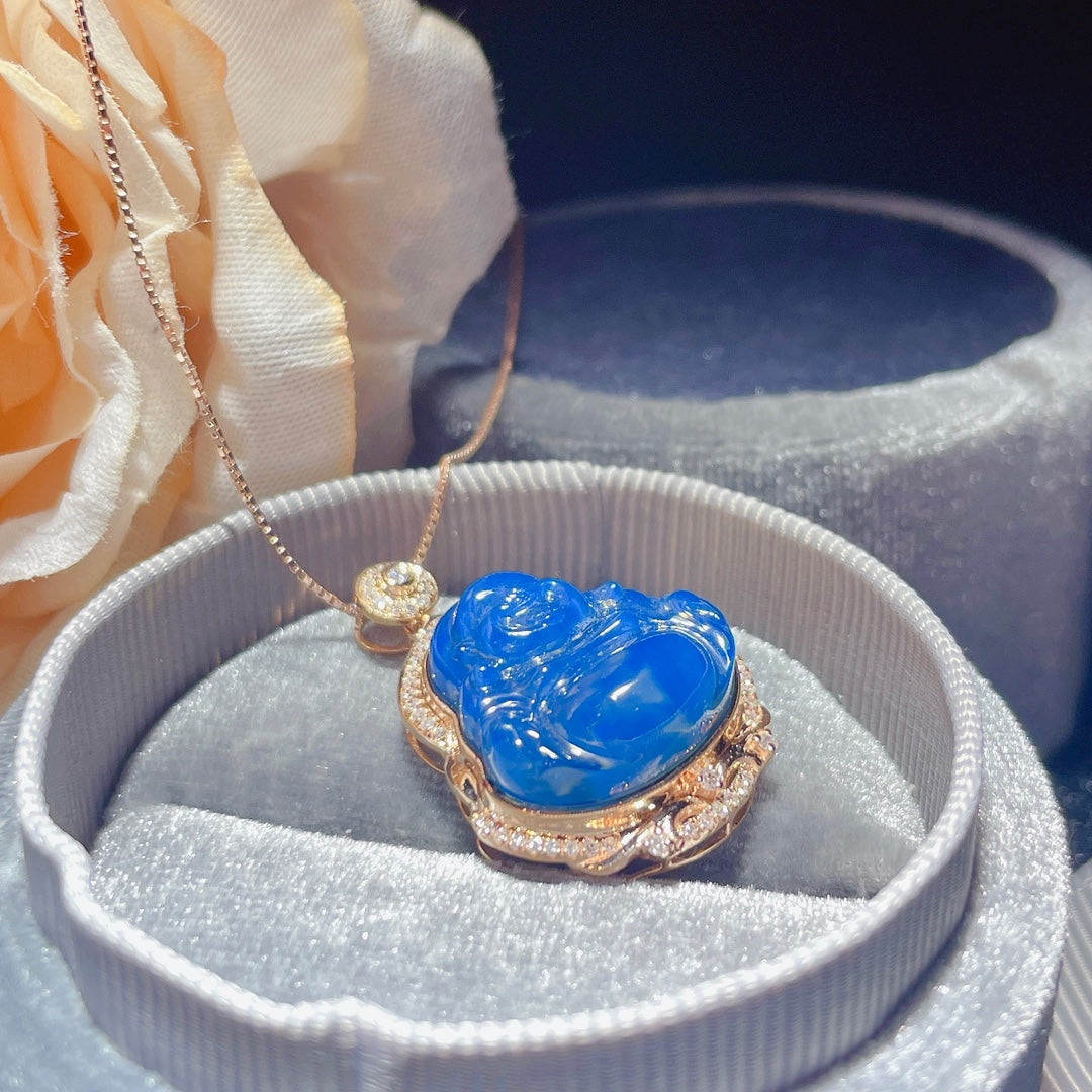 Nouveauté : Pendentif « Bouddha » en or 18 carats incrusté d'ambre bleu dominicain - Bijoux