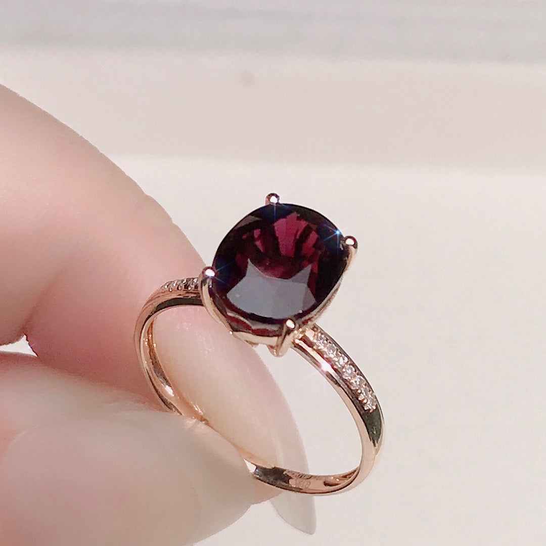 Elegante anillo Bixbite incrustado en oro de 18 quilates y diamantes: una joyería imprescindible