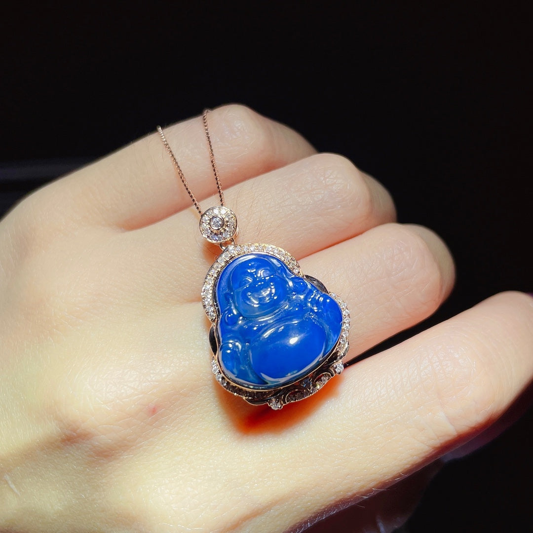 Nouveauté : Pendentif « Bouddha » en or 18 carats incrusté d'ambre bleu dominicain - Bijoux