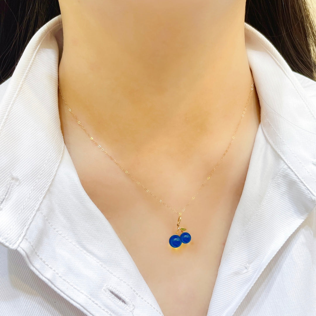 Exquisito Colgante de Ámbar Azul Dominicana Incrustado en Oro de 18k - Joyería