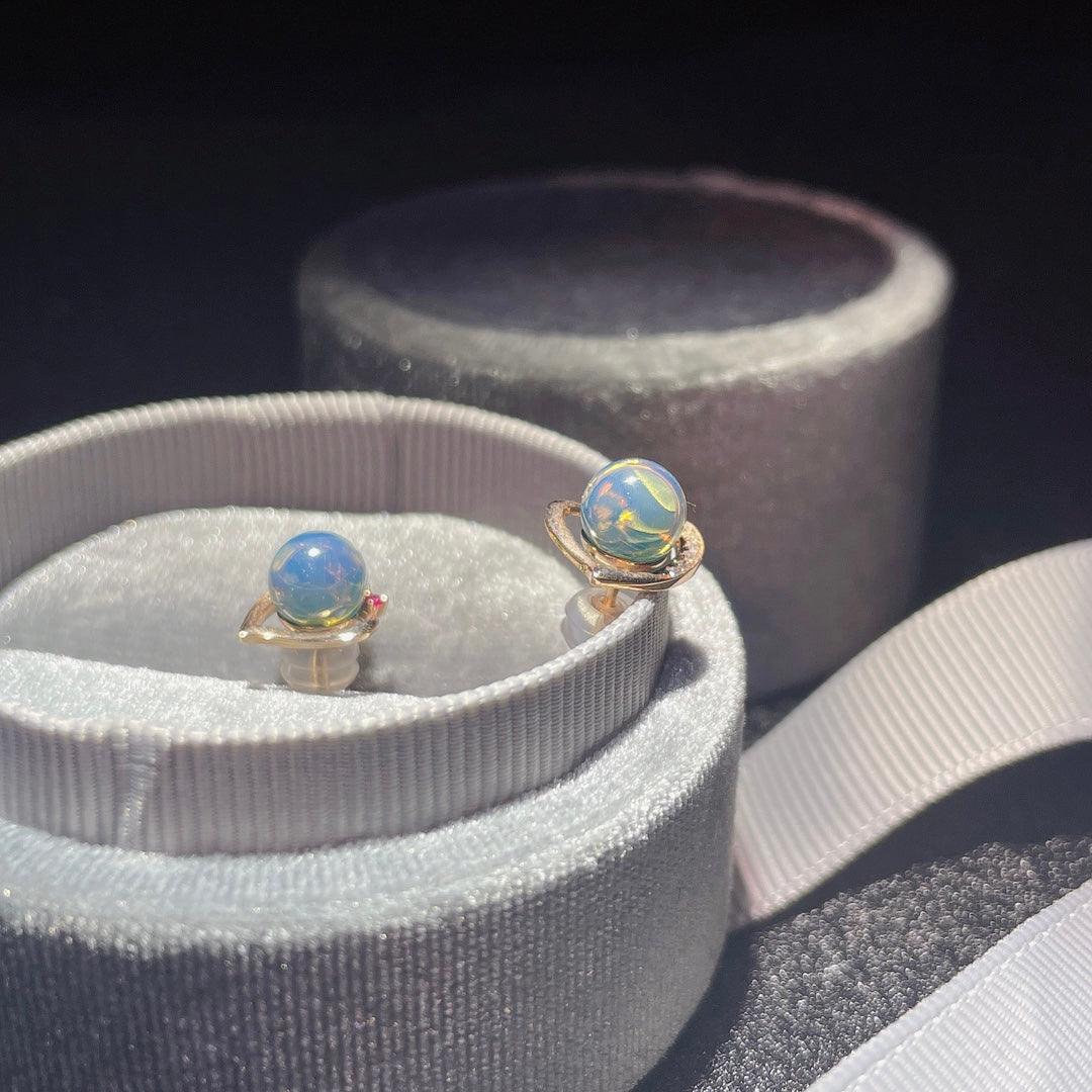 Unleash Your Aura with 18K Gold Embedded Dominican Blue Amber Earrings - Jewelry for the Unique You