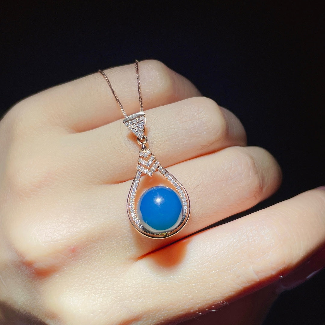 Nouveauté exclusive : bijoux pendentif en ambre bleu dominicain incrustés d'or 18 carats