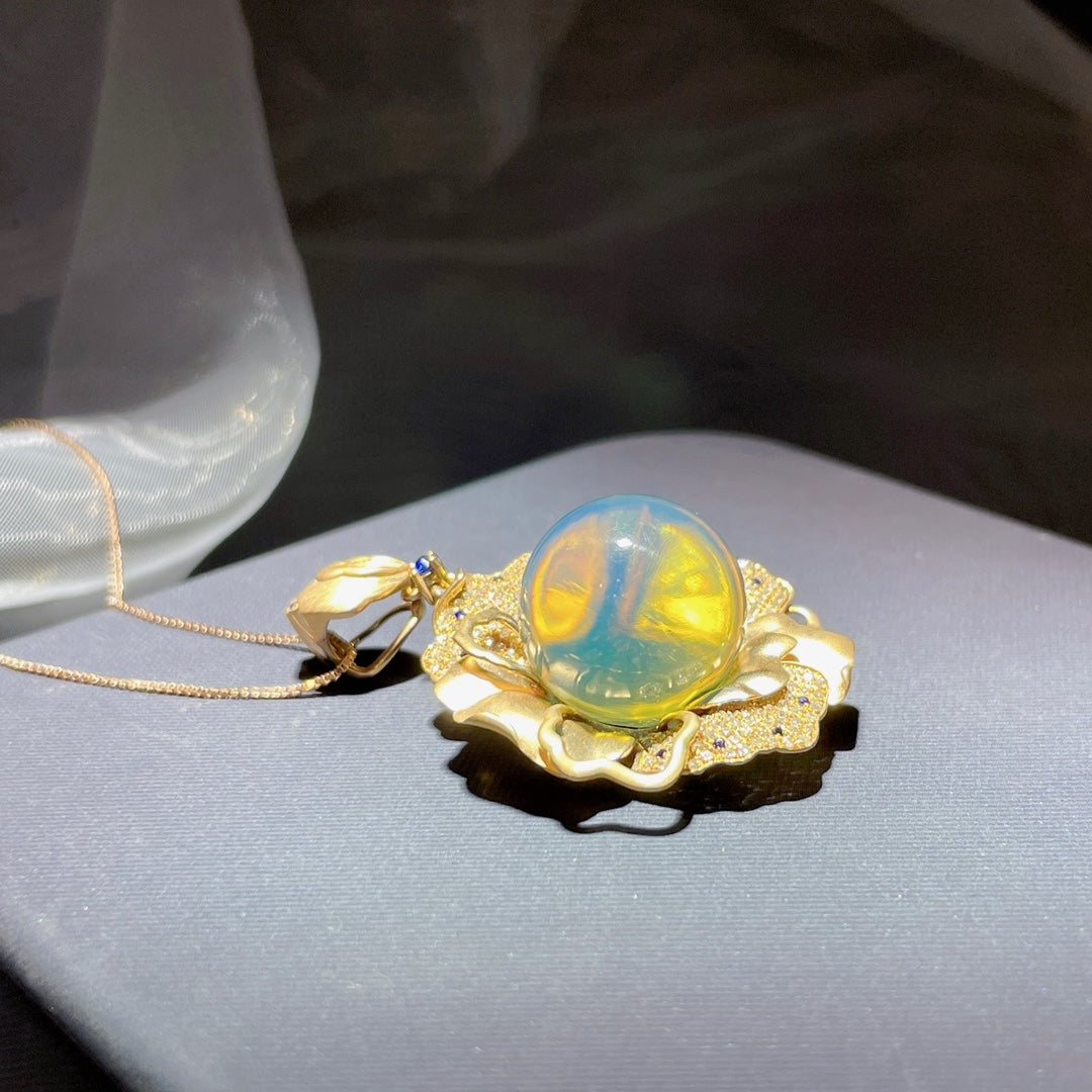 Colgante de Ámbar Azul Dominicana Incrustado en Oro de 18k - Joyería Exquisita