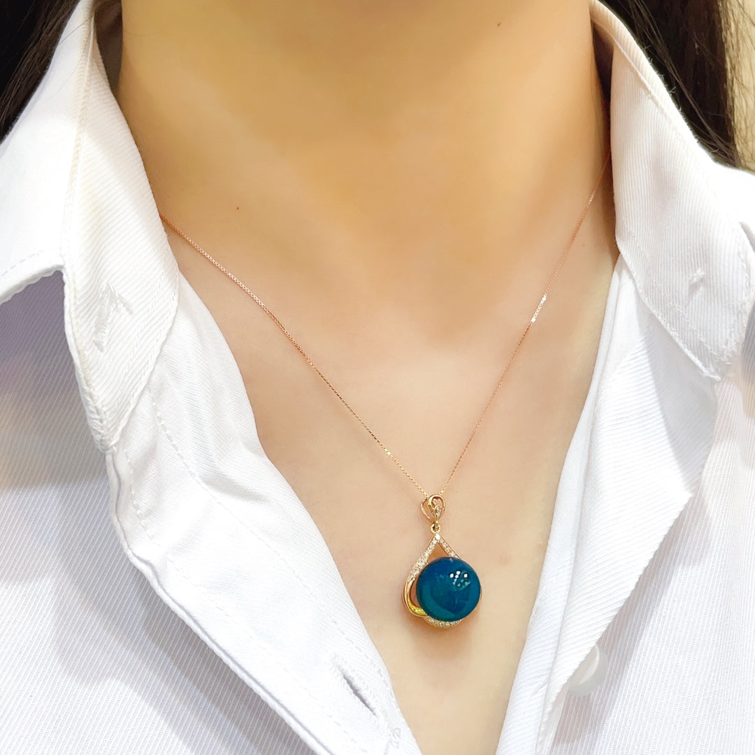 Colgante de Ámbar Azul Dominicana Incrustado en Oro de 18k - Joyería Exquisita