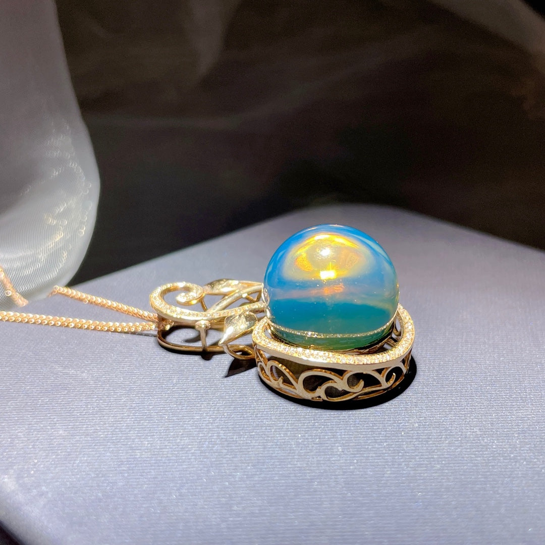 Colgante de Ámbar Azul Dominicana Incrustado en Oro de 18k - Joyería Exquisita