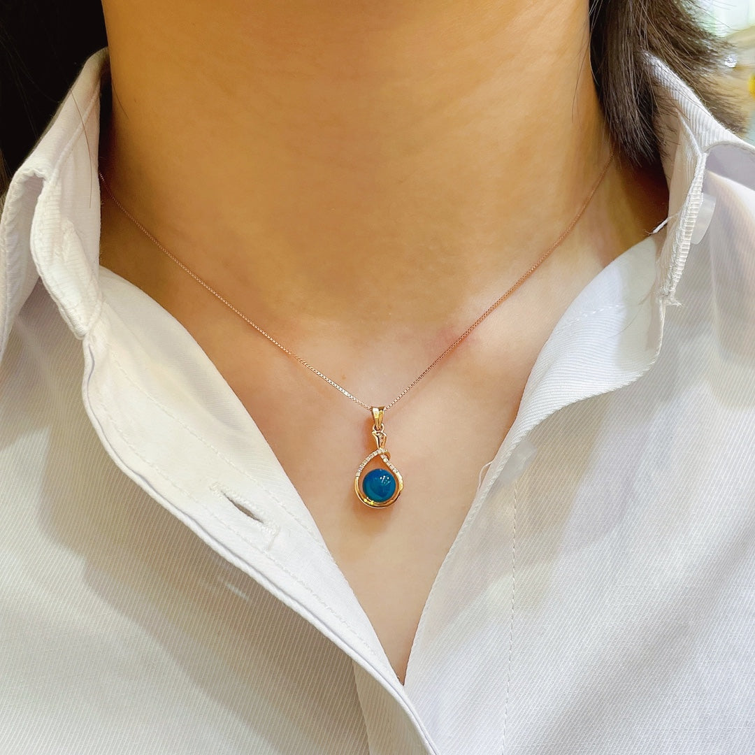 Exquis pendentif en ambre bleu dominicain incrusté d'or 18 carats - Bijoux