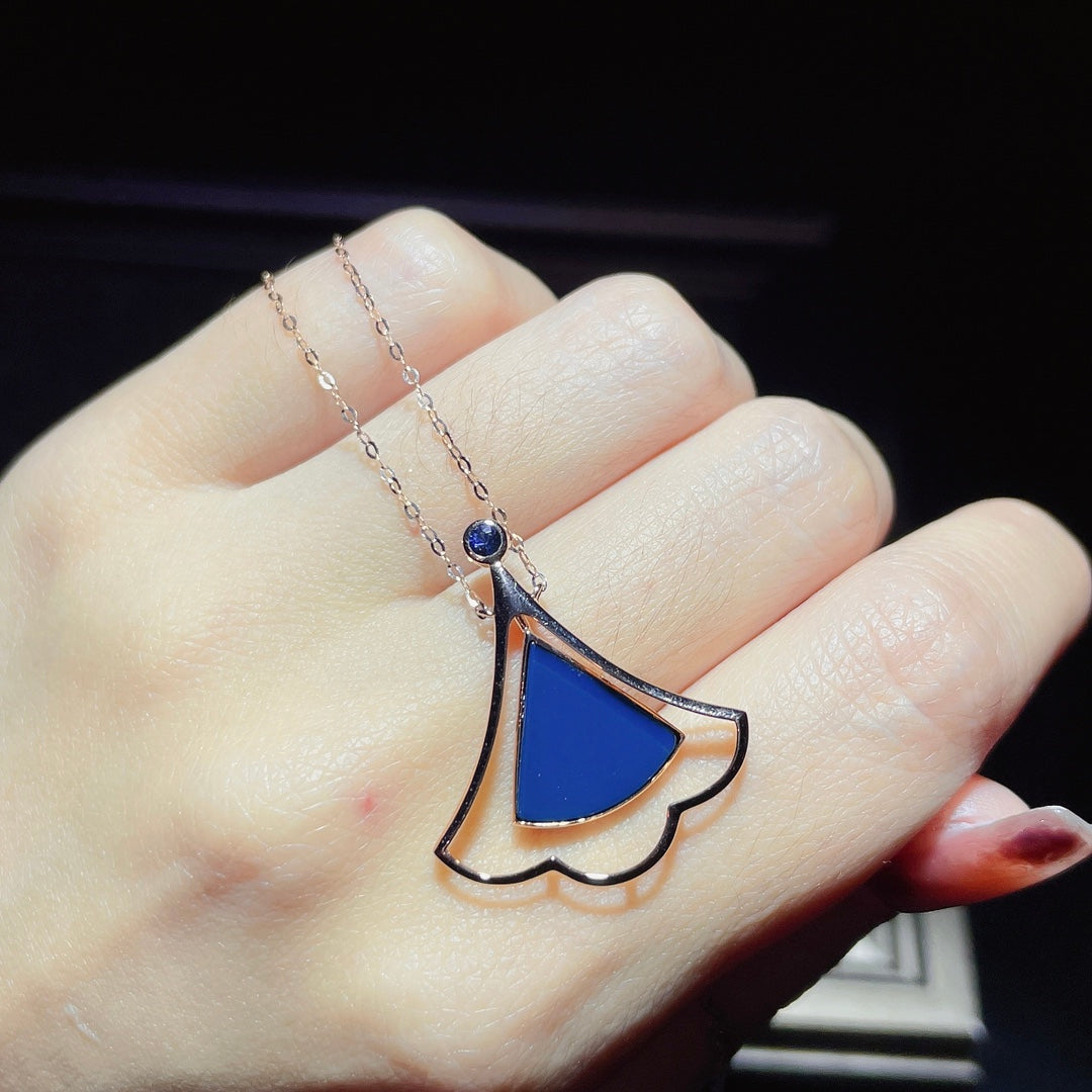 Jewelry Exclusive: 18K Gold Embedded Dominican Blue Amber Pendant